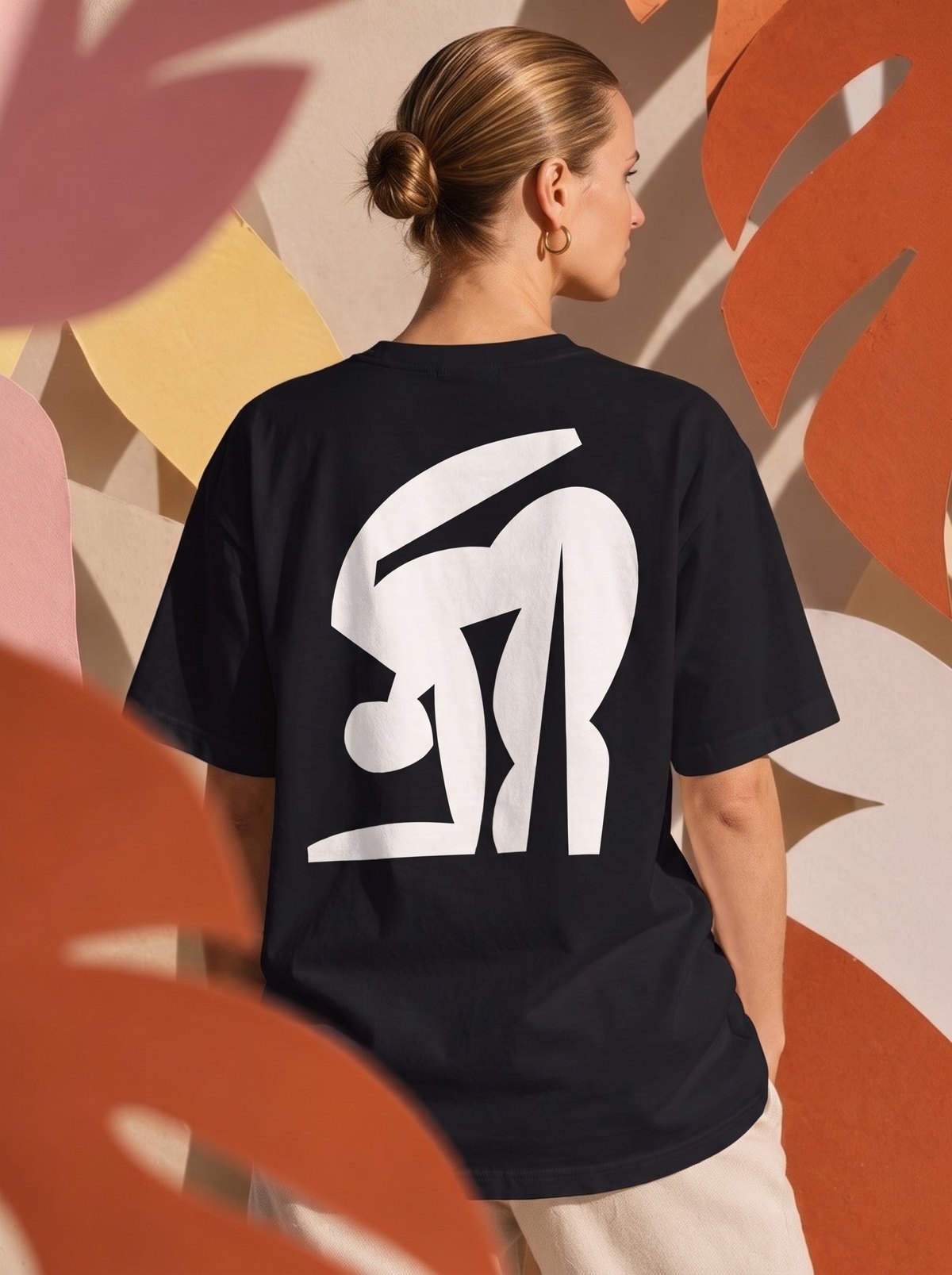 FEMME Bending tee, white ink on black, worn in the cut-out leaf set